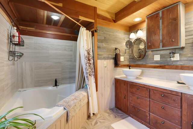 2655 County Road 550 E, Mahomet, IL 61853 - full bathroom with tile patterned floors, a sink, wood walls, shower / bath combo with shower curtain, and double vanity
