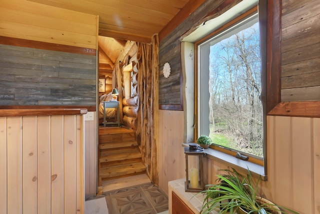 2655 County Road 550 E, Mahomet, IL 61853 - stairs with plenty of natural light, wooden ceiling, rustic walls, and wood walls