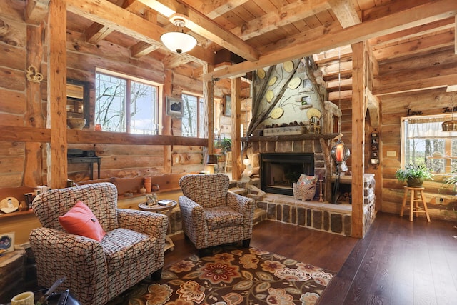 2655 County Road 550 E, Mahomet, IL 61853 - living room with log walls, beam ceiling, wood ceiling, and wood-type flooring