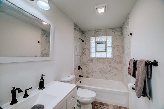 2775 E Riverview Dr, Kankakee, IL 60901 - bathroom with bathtub / shower combination, toilet, vanity, and wood finished floors
