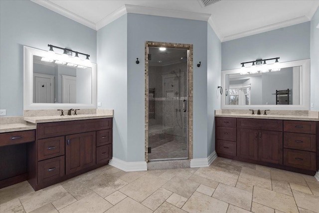 full bath featuring a shower stall, baseboards, and crown molding