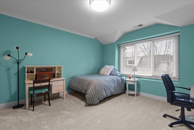 bedroom with carpet flooring, baseboards, vaulted ceiling, and visible vents