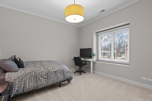 bedroom with baseboards, visible vents, crown molding, and carpet