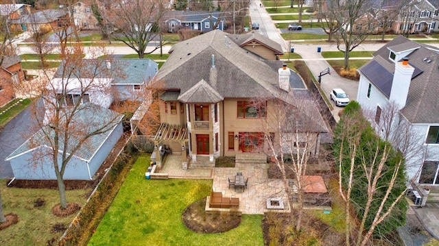 drone / aerial view with a residential view