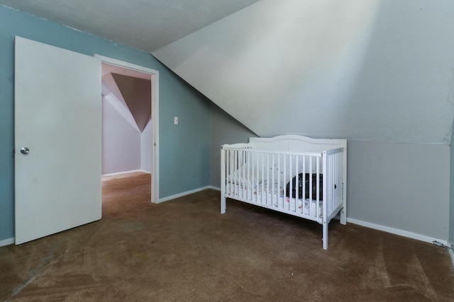 201 E Boundary St, Stanford, IL 61774 - bedroom featuring carpet, lofted ceiling, baseboards, and a nursery area