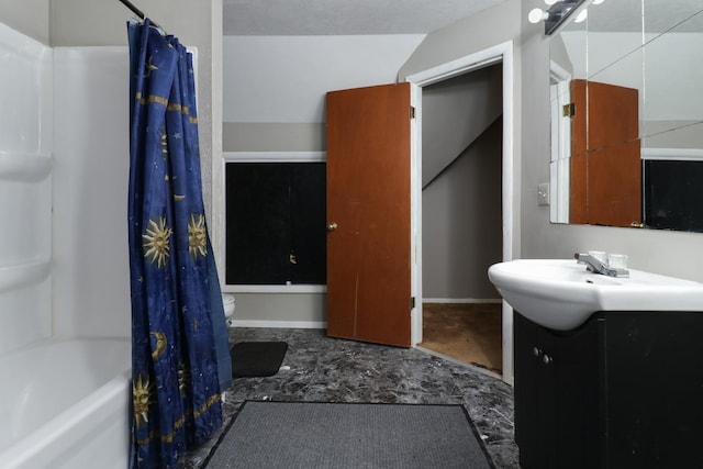 201 E Boundary St, Stanford, IL 61774 - full bath with vanity, shower / tub combo with curtain, toilet, and baseboards