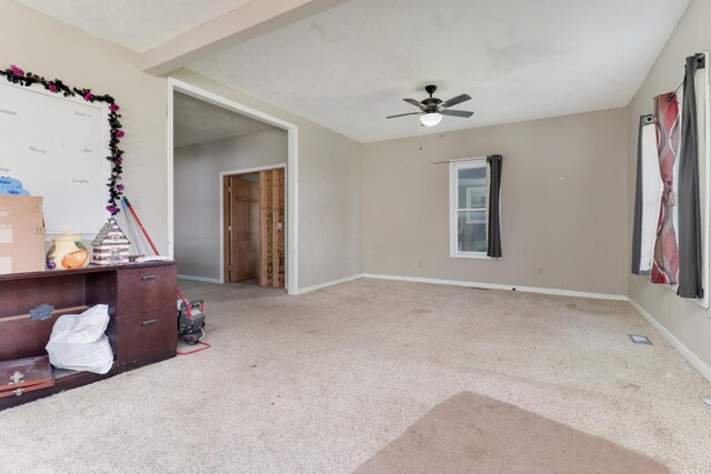 201 E Boundary St, Stanford, IL 61774 - carpeted spare room featuring ceiling fan and baseboards