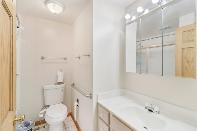 bathroom featuring toilet, tile patterned floors, vanity, and visible vents