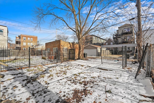 exterior space featuring an outdoor structure and fence
