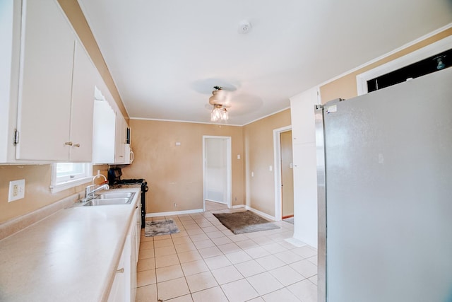 245 E 4th Ave, Clifton, IL 60927 - kitchen with a sink, light tile patterned floors, white cabinets, and light countertops