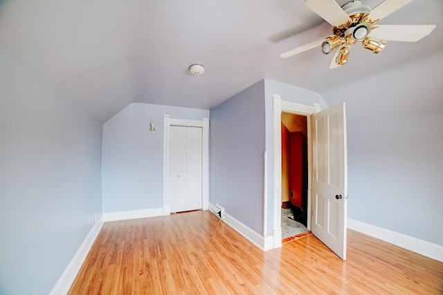 245 E 4th Ave, Clifton, IL 60927 - bonus room with a ceiling fan, baseboards, lofted ceiling, and light wood-style floors