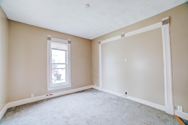245 E 4th Ave, Clifton, IL 60927 - spare room with baseboards and light colored carpet