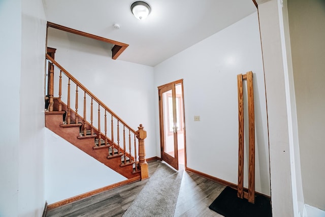 245 E 4th Ave, Clifton, IL 60927 - entryway featuring baseboards, stairs, and wood finished floors