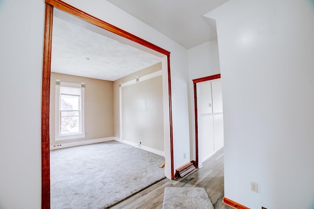 245 E 4th Ave, Clifton, IL 60927 - empty room with baseboards and wood finished floors