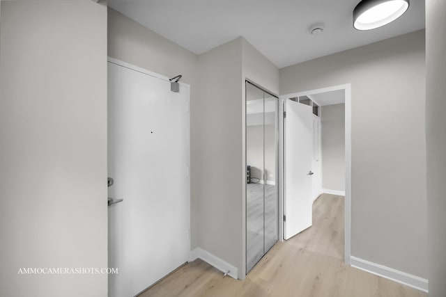 4970 N Marine Dr Unit 526, Chicago, IL 60640 - bathroom featuring baseboards and wood finished floors