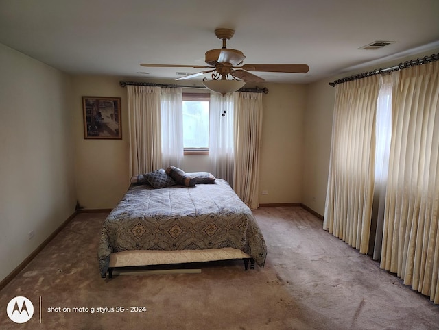 8550 S Avalon Ave, Chicago, IL 60619 - carpeted bedroom featuring baseboards and a ceiling fan