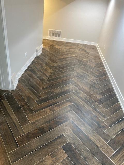 interior details with visible vents and baseboards
