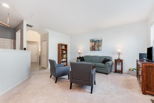 living room featuring light colored carpet, baseboards, and visible vents