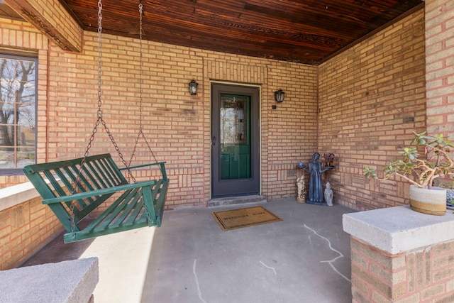 17864 Gladville Ave, Homewood, IL 60430 - entrance to property with a porch and brick siding