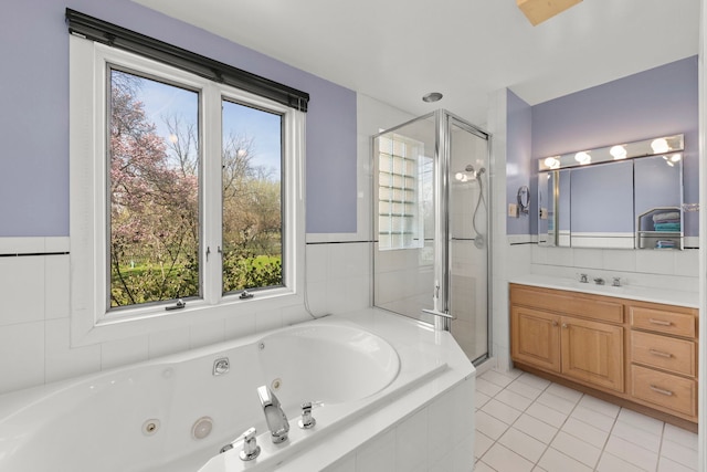 17864 Gladville Ave, Homewood, IL 60430 - bathroom featuring a shower stall, tile patterned floors, vanity, and a whirlpool tub