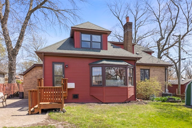 17864 Gladville Ave, Homewood, IL 60430 - view of front of home featuring fence, a shingled roof, a front lawn, and a chimney