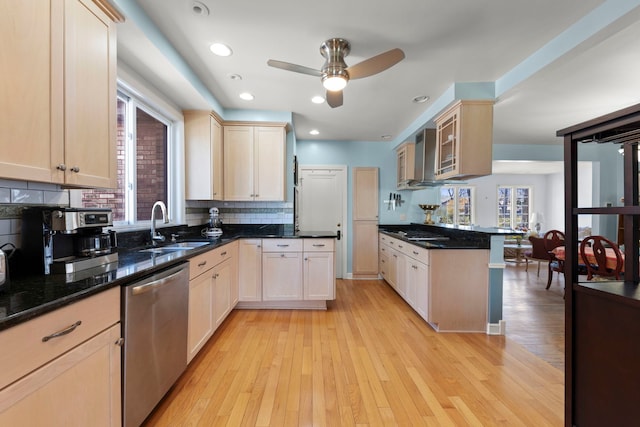 17864 Gladville Ave, Homewood, IL 60430 - kitchen with stainless steel dishwasher, a sink, light wood-type flooring, ceiling fan, and a peninsula
