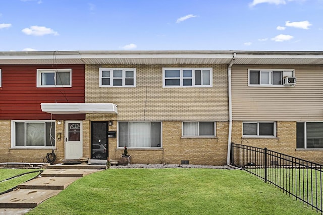 230 Dodge Ave Unit D, Evanston, IL 60202 - view of front of home with brick siding, fence, and a front lawn