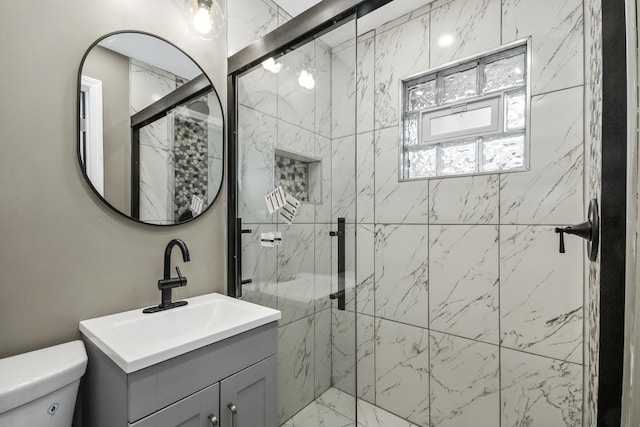 230 Dodge Ave Unit D, Evanston, IL 60202 - full bath with toilet, vanity, and a marble finish shower