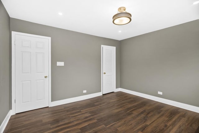 230 Dodge Ave Unit D, Evanston, IL 60202 - empty room featuring dark wood-style floors and baseboards