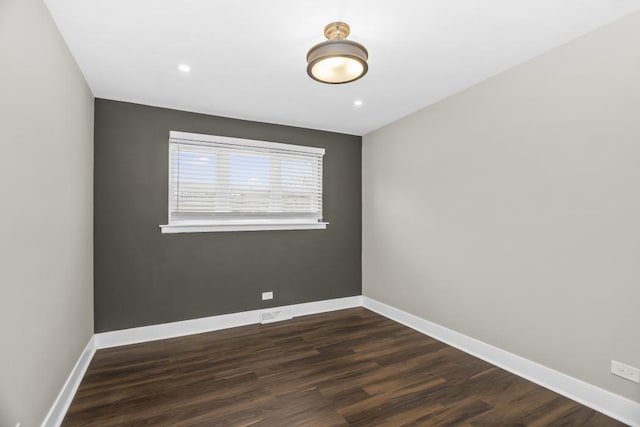 230 Dodge Ave Unit D, Evanston, IL 60202 - unfurnished room featuring baseboards, dark wood-style flooring, and recessed lighting