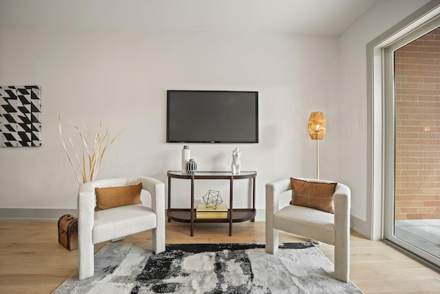 1548 W Ardmore Ave Unit 2F, Chicago, IL 60660 - sitting room featuring wood finished floors and baseboards