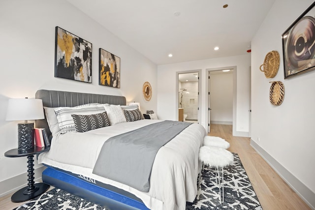 1548 W Ardmore Ave Unit 2F, Chicago, IL 60660 - bedroom with light wood finished floors, recessed lighting, and ensuite bath