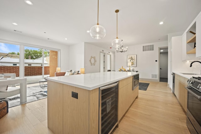 1548 W Ardmore Ave Unit 2F, Chicago, IL 60660 - kitchen featuring beverage cooler, modern cabinets, light brown cabinets, stainless steel appliances, and open shelves