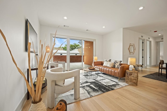 1548 W Ardmore Ave Unit 2F, Chicago, IL 60660 - living room with light wood-type flooring and recessed lighting