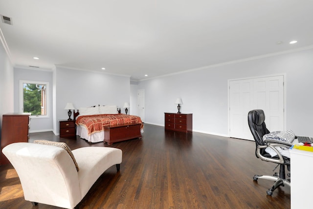 bedroom featuring ornamental molding, wood finished floors, and recessed lighting