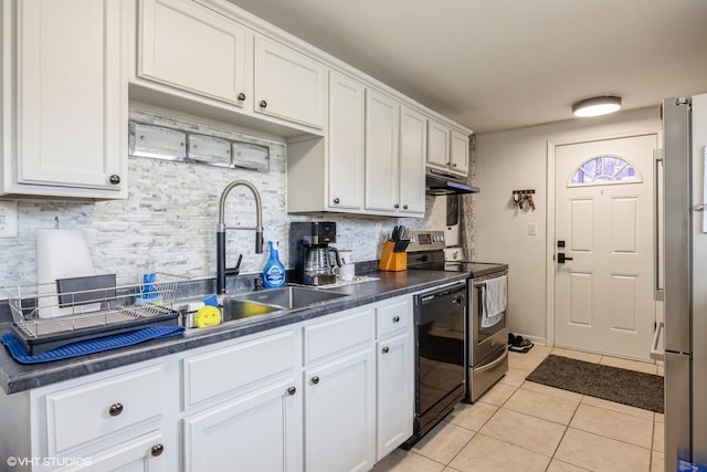 kitchen featuring white cabinetry, light tile patterned floors, under cabinet range hood, dark countertops, and appliances with stainless steel finishes