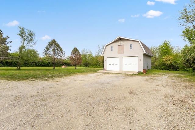 19049 S Parker Rd, Mokena, IL 60448 - view of property exterior with a gambrel roof, a garage, and an outbuilding