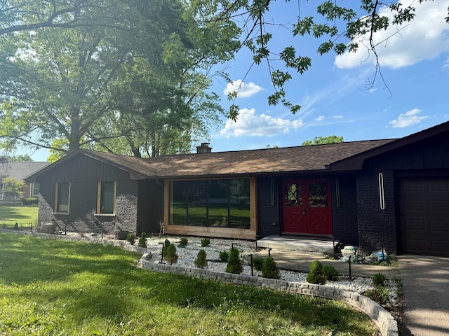 1854 Winmoor Ct, Sleepy Hollow, IL 60118 - view of front facade with a front yard, a chimney, and a garage