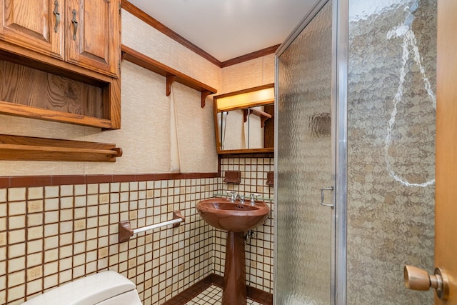 129 Roth Ave, Barrington, IL 60010 - bathroom featuring toilet, tile walls, crown molding, a stall shower, and a sink
