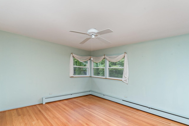 129 Roth Ave, Barrington, IL 60010 - unfurnished room with ceiling fan, wood finished floors, a baseboard heating unit, and a baseboard radiator