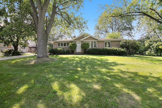 12332 S Harold Ave, Palos Heights, IL 60463 - single story home featuring brick siding, a chimney, and a front lawn