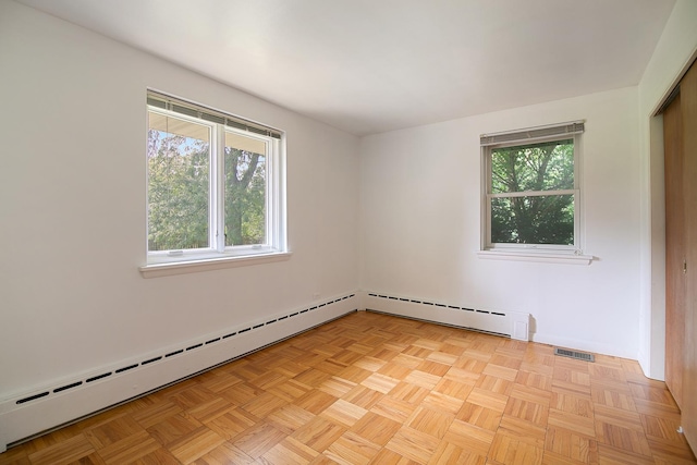 12332 S Harold Ave, Palos Heights, IL 60463 - empty room featuring visible vents and a baseboard radiator