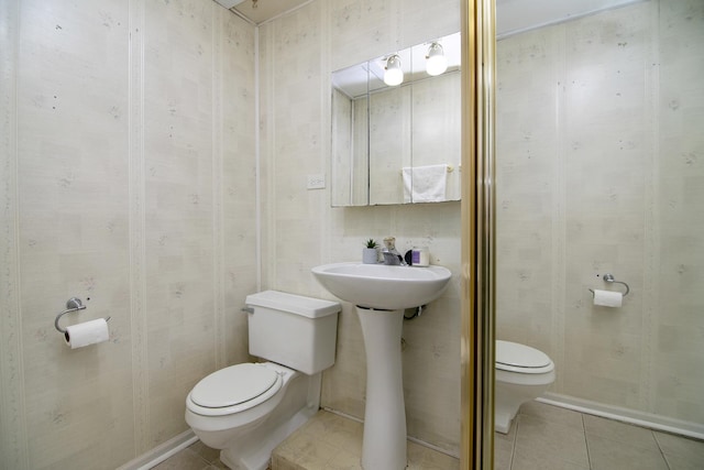 12332 S Harold Ave, Palos Heights, IL 60463 - bathroom with a sink, toilet, and tile patterned flooring
