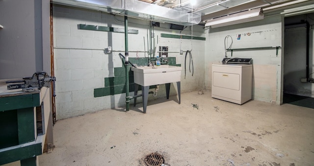 12332 S Harold Ave, Palos Heights, IL 60463 - basement featuring a workshop area, a sink, concrete block wall, and washer / dryer