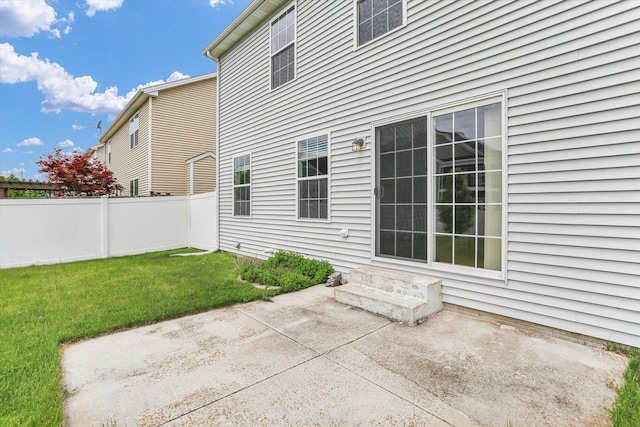 back of house with a patio and entry steps