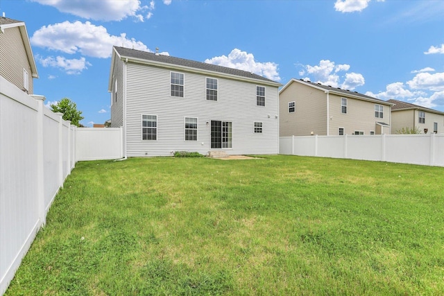 rear view of property featuring entry steps