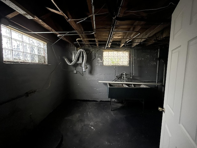 basement featuring a sink