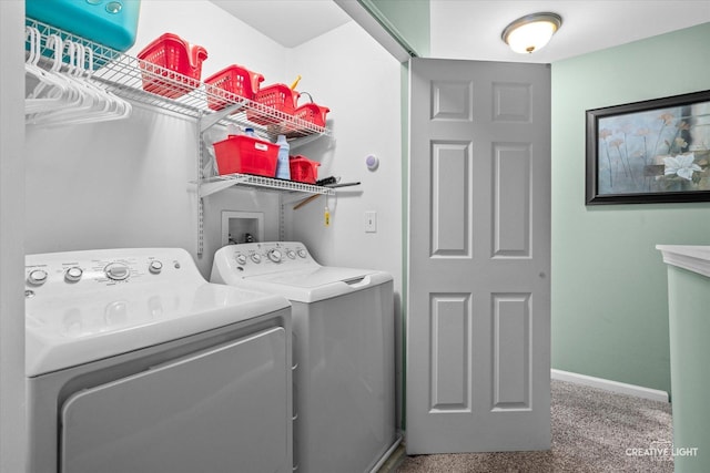 washroom featuring baseboards, carpet floors, laundry area, and independent washer and dryer