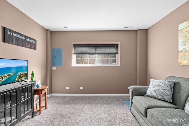 living room with baseboards, electric panel, and carpet flooring