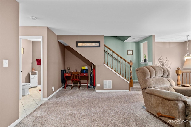 carpeted living room with tile patterned flooring, stairs, visible vents, and baseboards